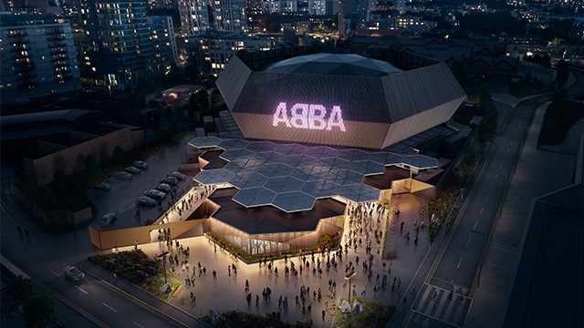 Image of ABBA Arena at Queen Elizabeth Olympic Stadium with London skyline at night. Image courtesy of Alan Schaller.